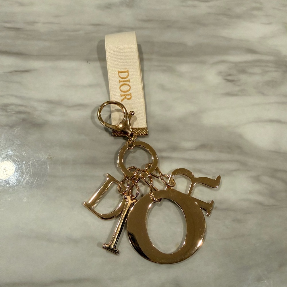 Dior Gold Letter Charm Key Chain With Ivory/Cream Ribbon